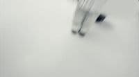a blurry photo of a person walking in the snow