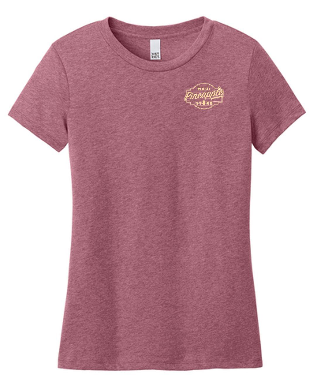 a women's t - shirt with a gold logo on the chest