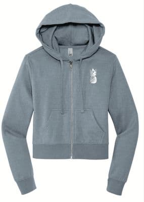 a women's sweatshirt with a pineapple embroidered on the front