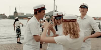 a group of people standing next to each other