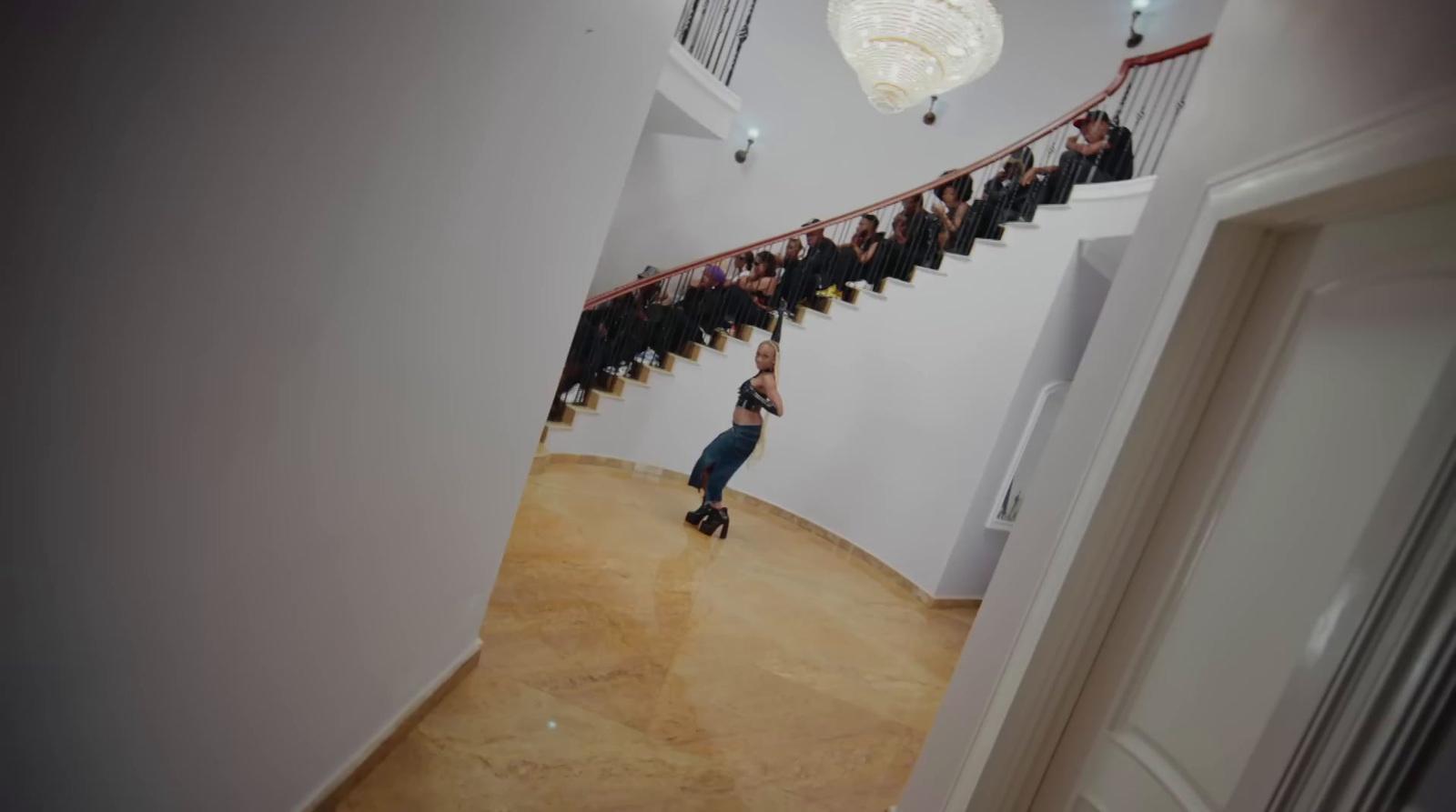 a group of people standing on a staircase