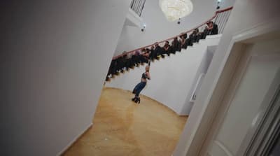 a group of people standing on a staircase