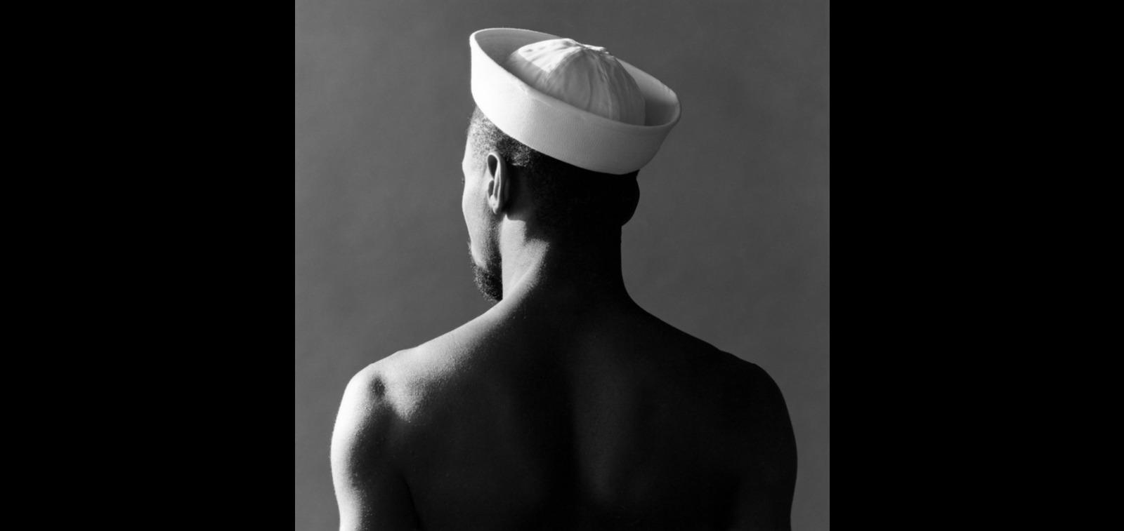a man with a hat on his head