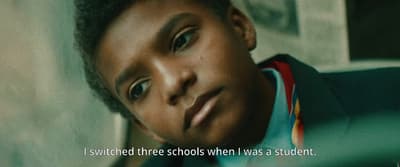 a young boy with a quote on his face