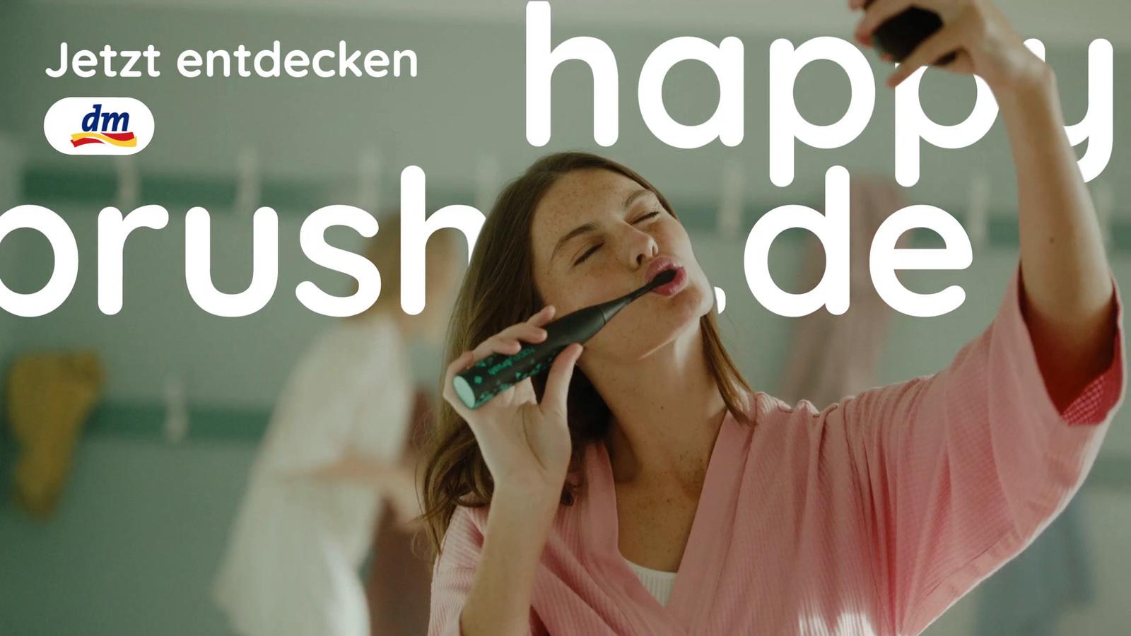 a woman holding a cell phone up to her ear