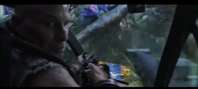 a man holding a gun in his right hand
