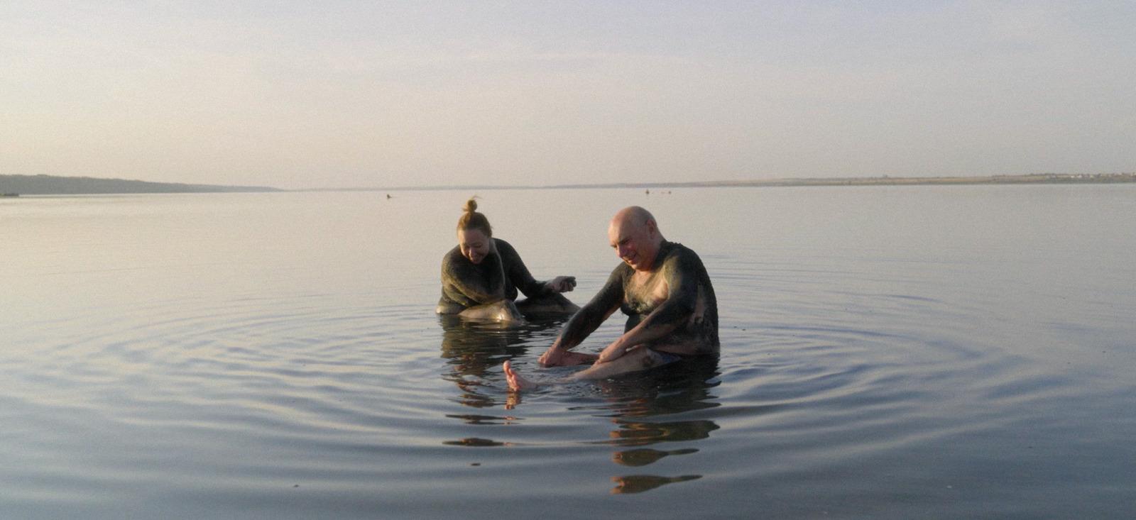 a man and a woman in the water
