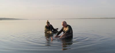 a man and a woman in the water
