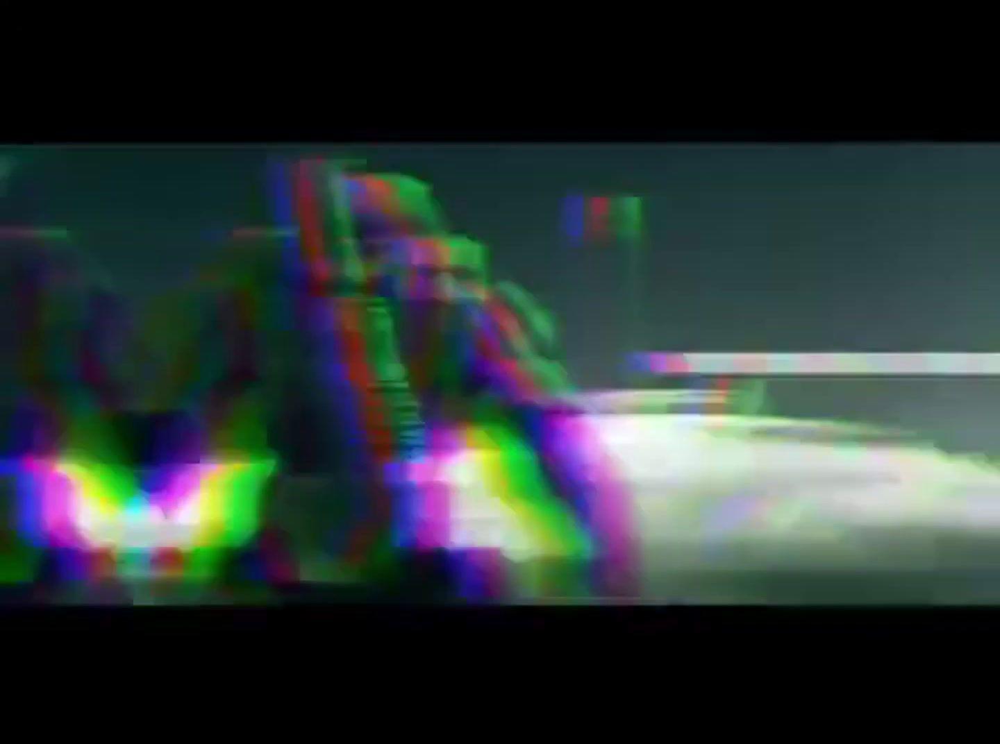 a blurry image of a car driving down a street