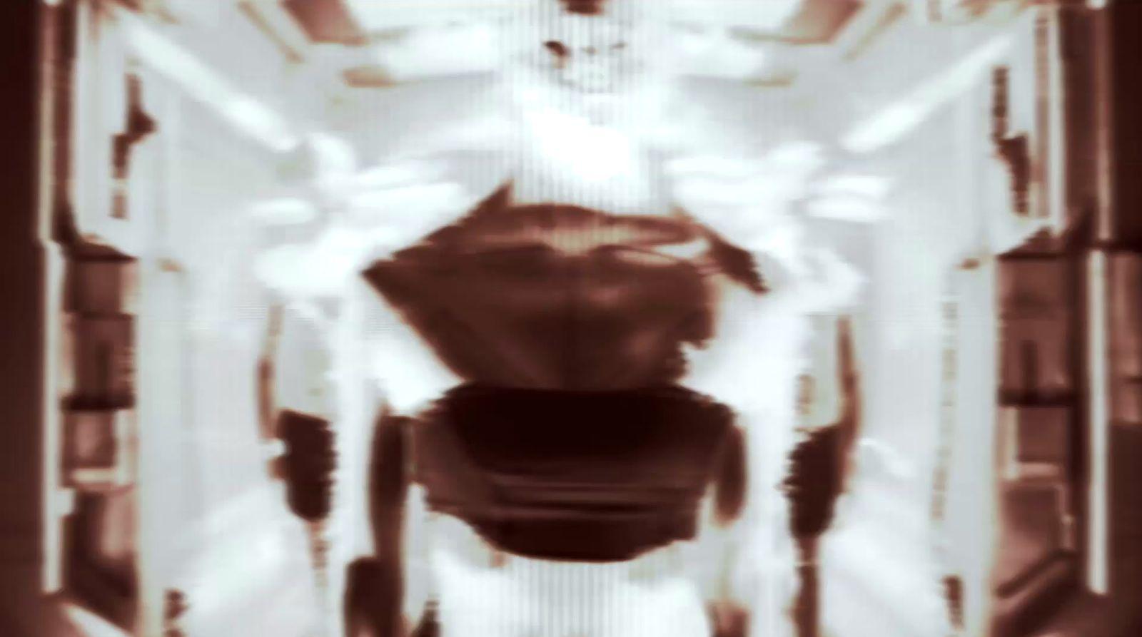 a blurry image of a person standing in a room
