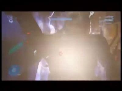 a blurry image of a person standing in a dark room