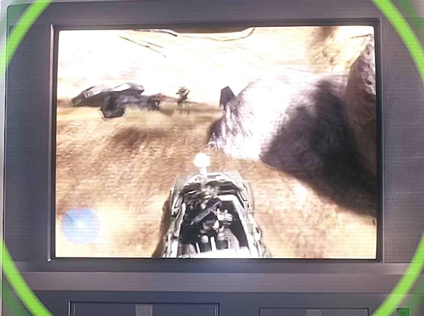 a television screen with a picture of a person riding a motorcycle