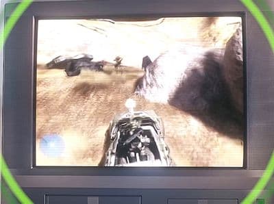 a television screen with a picture of a person riding a motorcycle