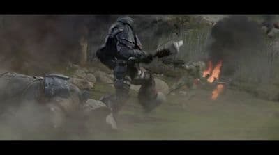 a man on a horse with a gun in his hand