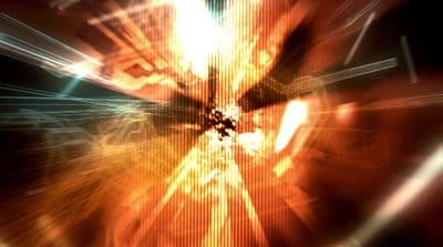 a blurry image of a person holding a cell phone