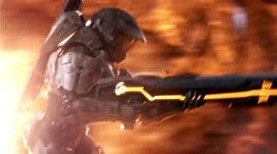 a man in a futuristic suit holding a sword
