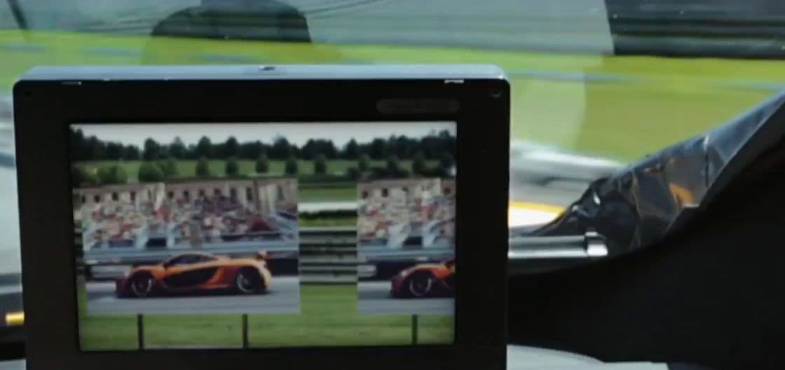 a picture of a sports car in a car mirror