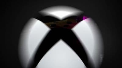 a close up of a white and black object