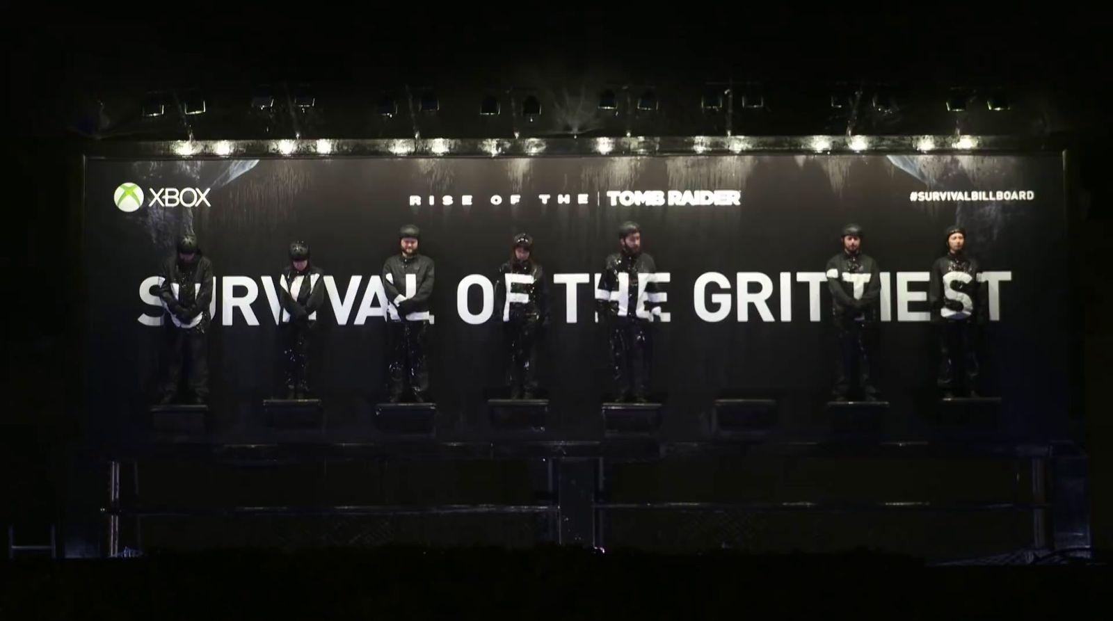 a group of men standing on top of a stage
