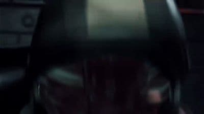 a blurry photo of a person in a dark room