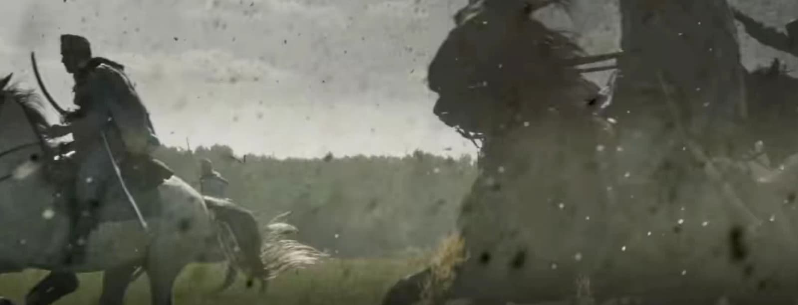 a man riding on the back of a white horse