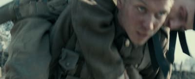 a man in a military uniform is flying through the air
