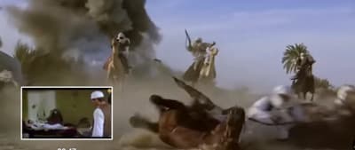 a group of people riding horses in the desert