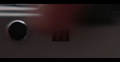 a close up of a metal object with a blurry background