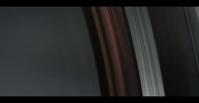 a black and white photo of saturn taken from space