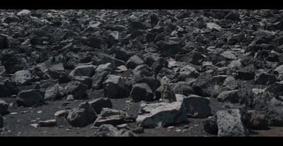 a bunch of rocks that are on the ground