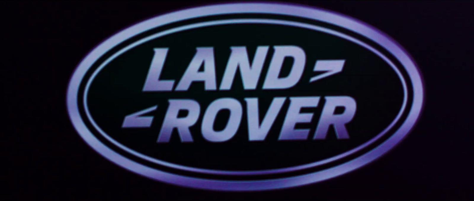 a black and white sign that says land rover