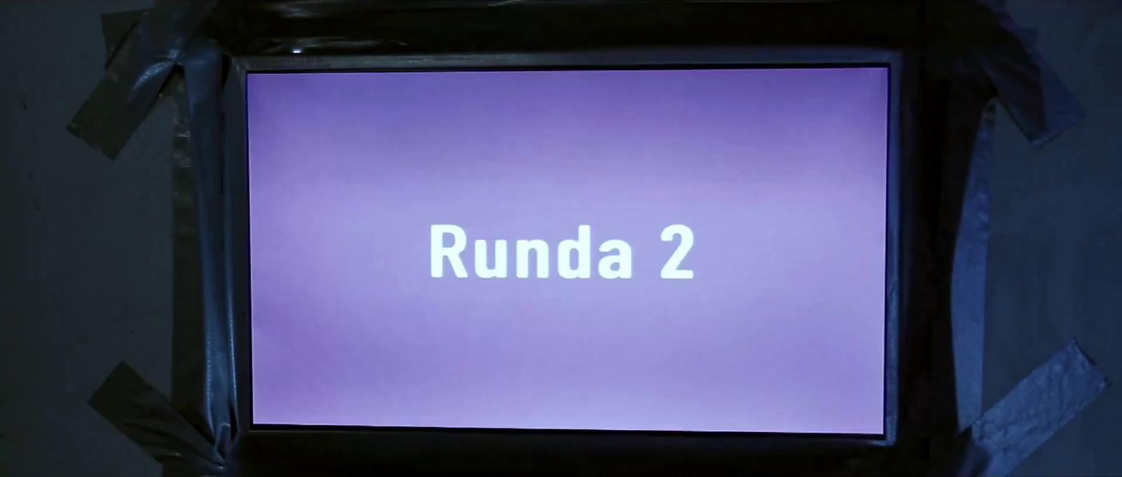 a purple screen with the words runda 2 on it