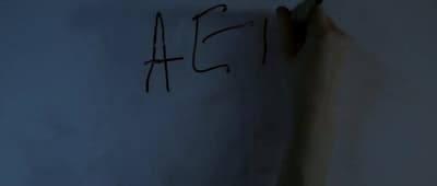 a white wall with writing written on it