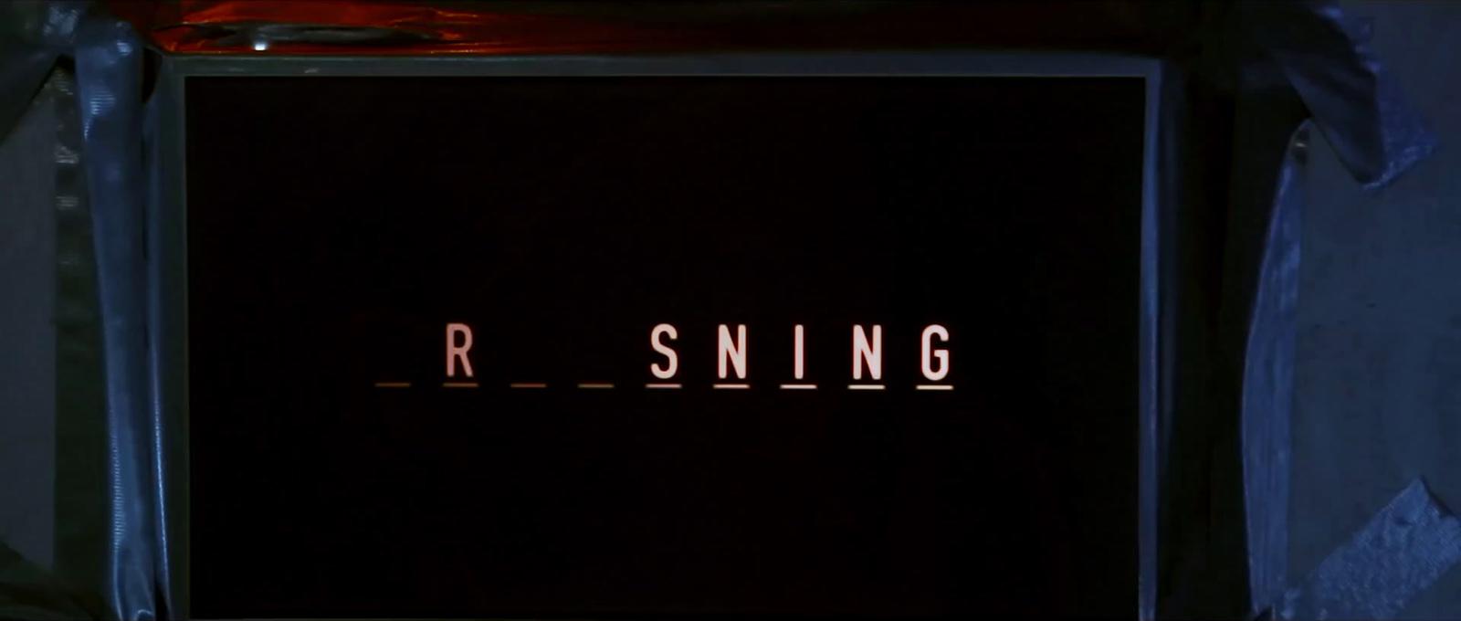 a black box with the word r - sning written on it