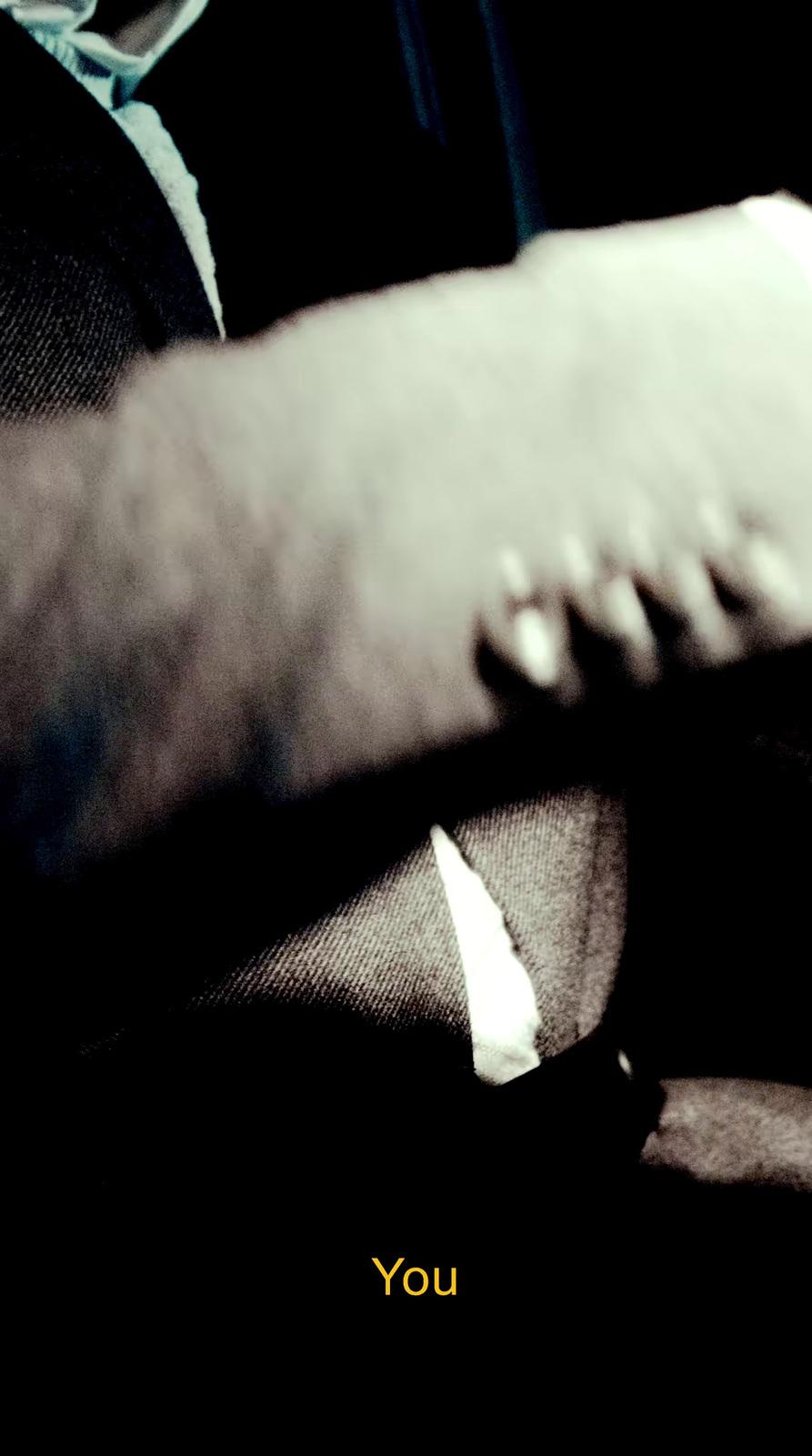 a close up of a person typing on a keyboard
