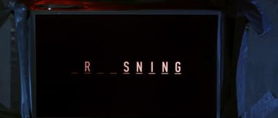 a black box with the word r - sning on it