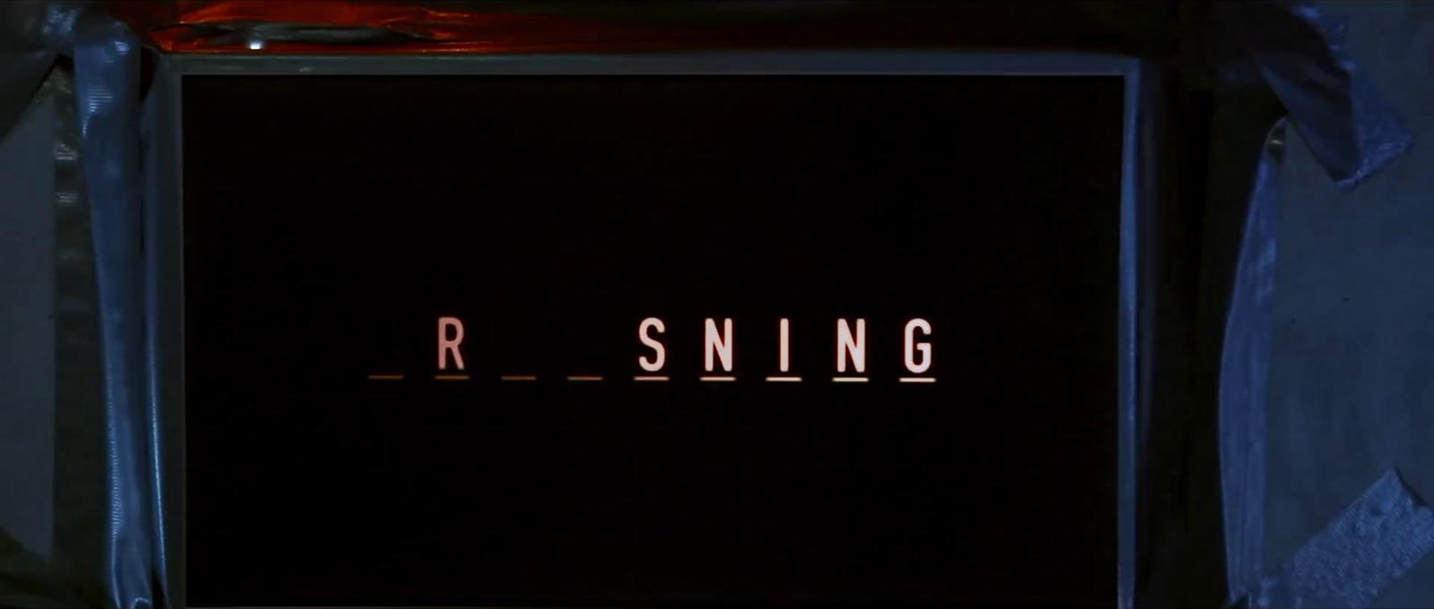 a black box with the word r - sning on it