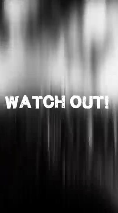 a black and white photo with the words watch out
