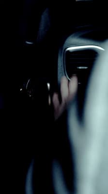 a person holding a cell phone in their hand