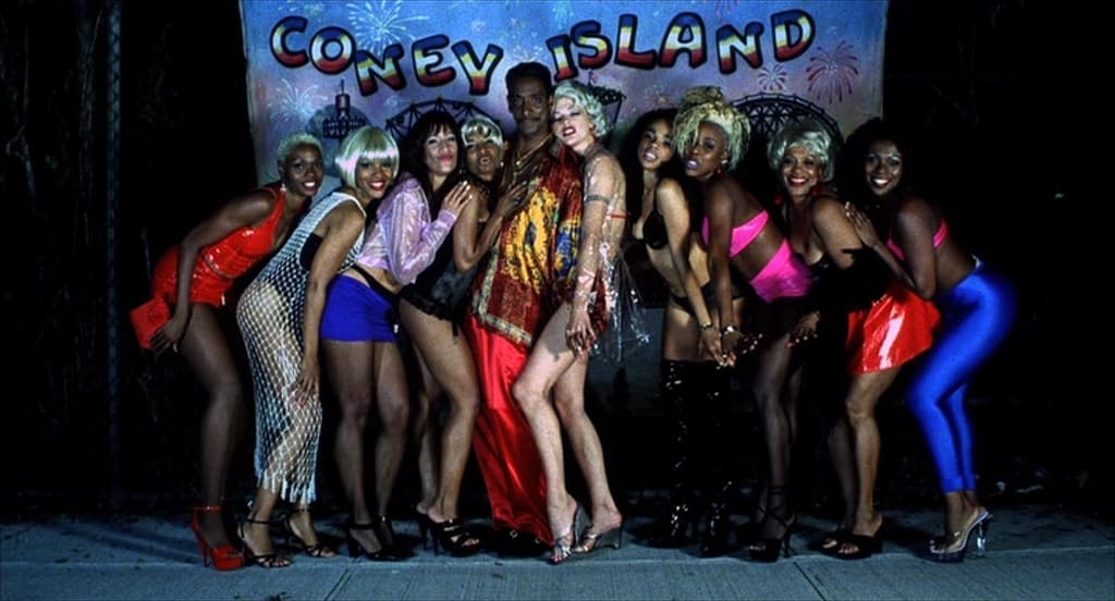 a group of women standing next to each other on a stage