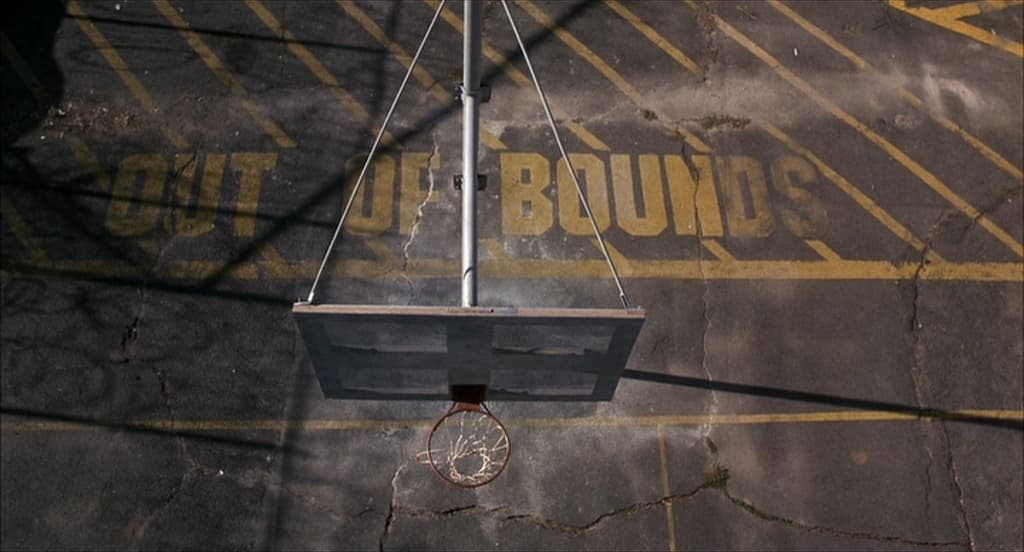an overhead view of a basketball court with a basketball hoop