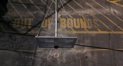 an overhead view of a basketball court with a basketball hoop