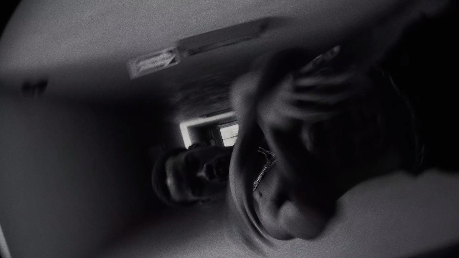 a close up of a person's hand holding a camera