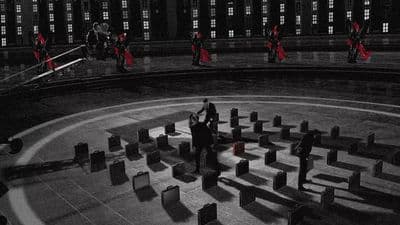 a black and white photo of people in a circle
