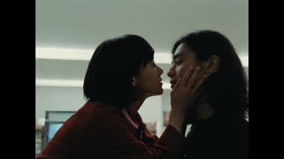 a couple of women standing next to each other