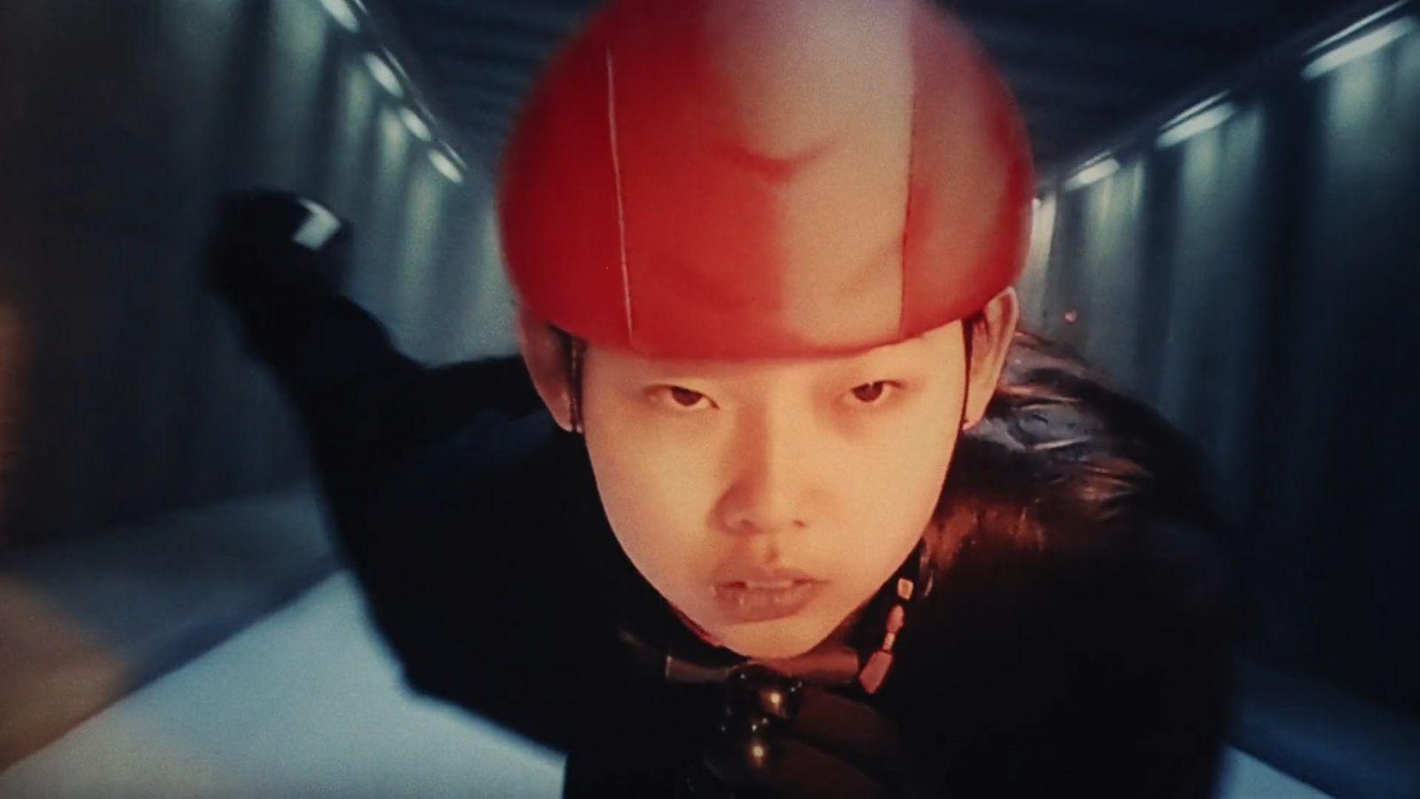 a man with a red helmet on his head