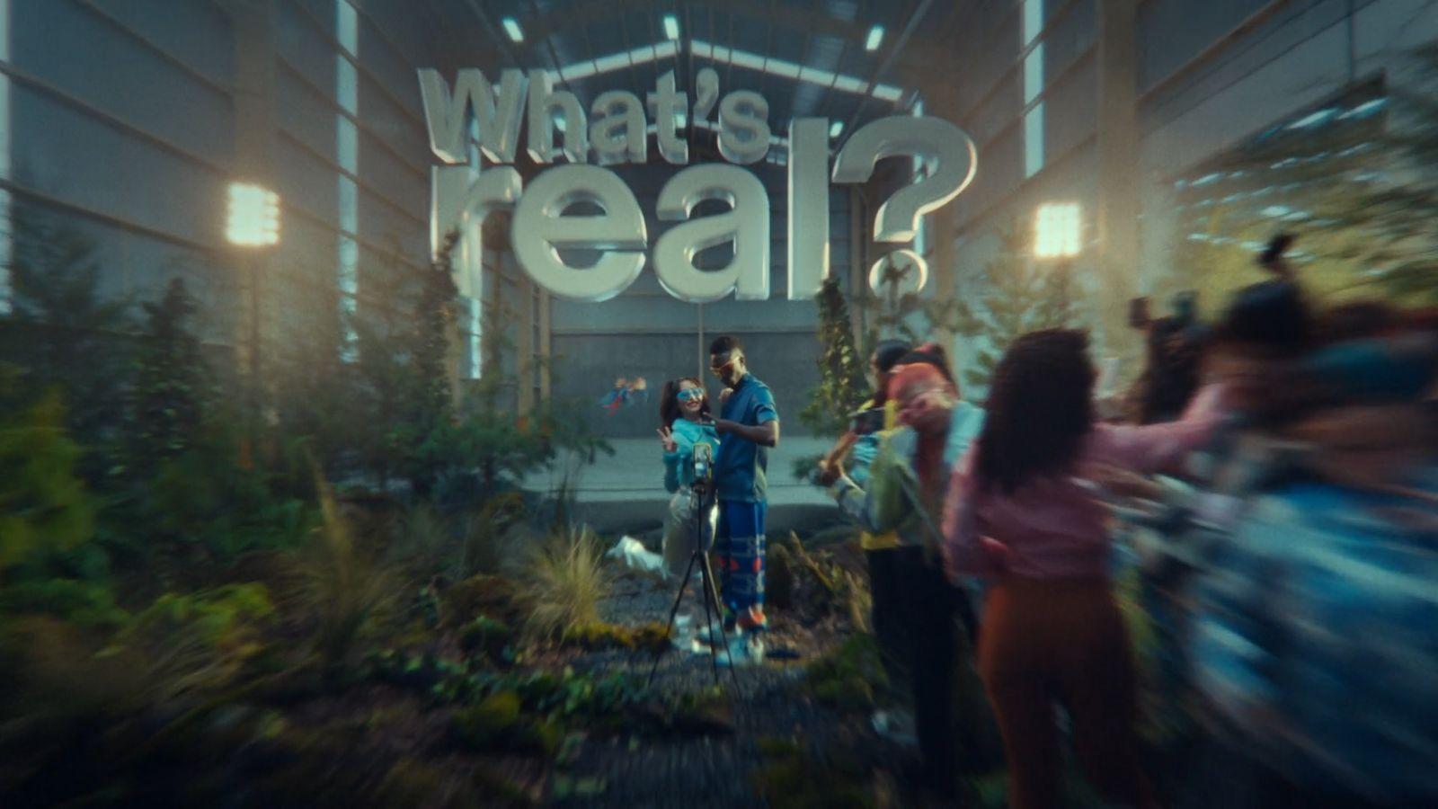 a group of people standing in front of a sign