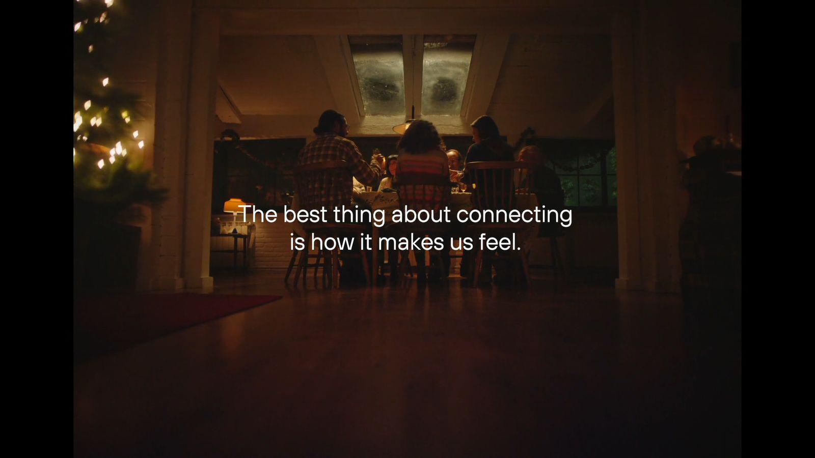 a group of people sitting around a table