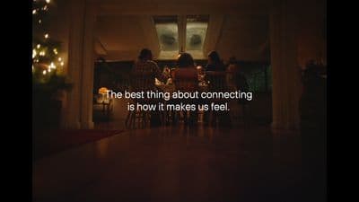 a group of people sitting around a table