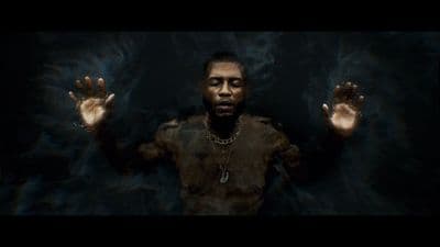a man with his hands in the air